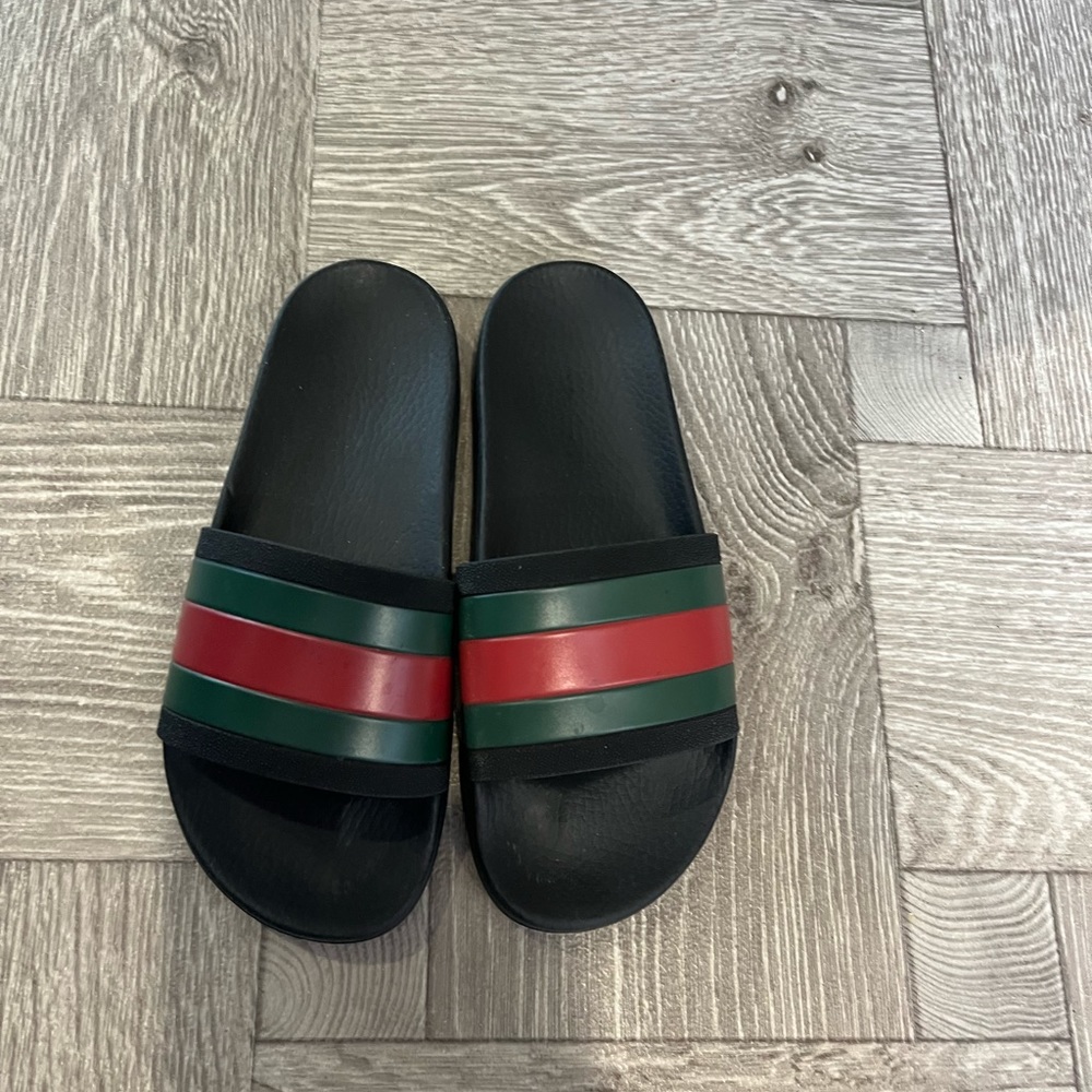 Authentic Gucci rubber slides. Mens 7 or womens 9